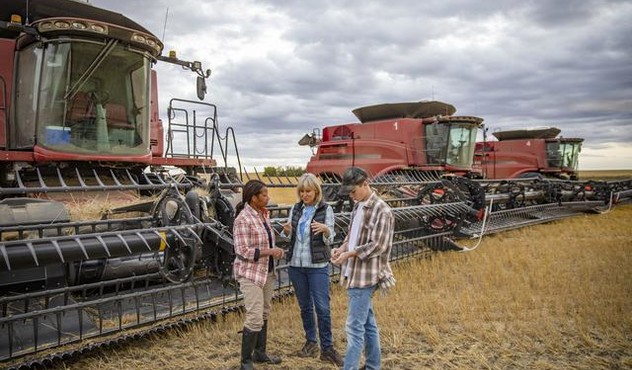 Farmers with Combines