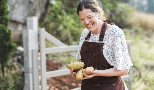 Woman Holding Potatoes