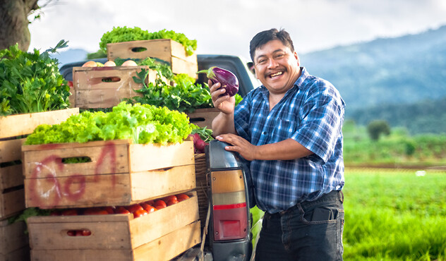 Farmer with produce Farmer with produce