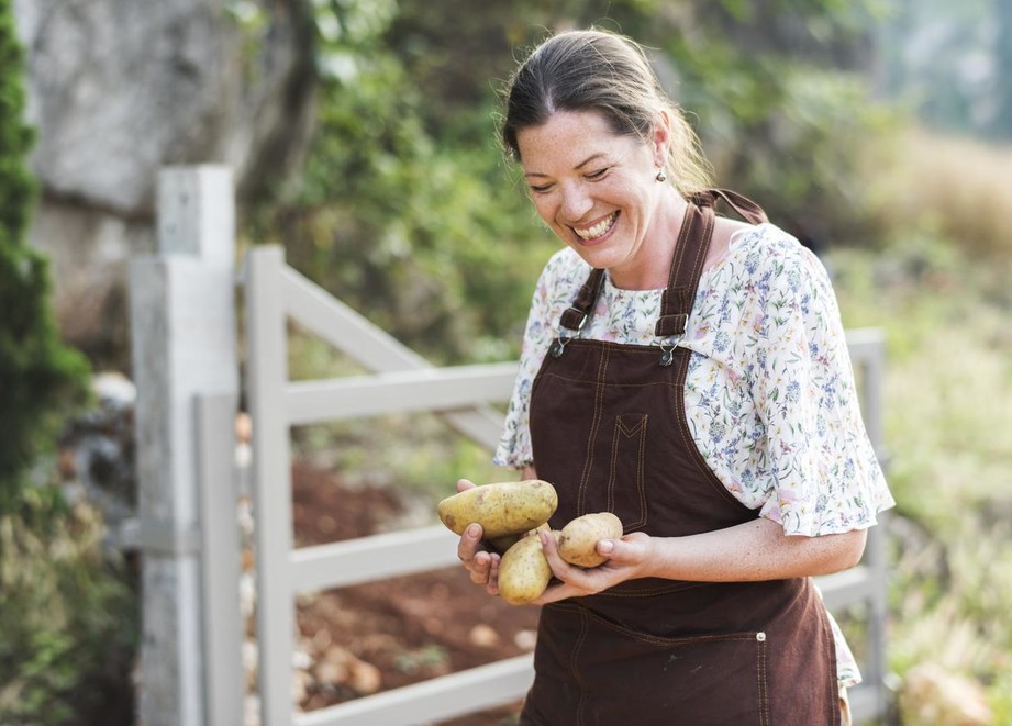 Woman Holding Potatoes