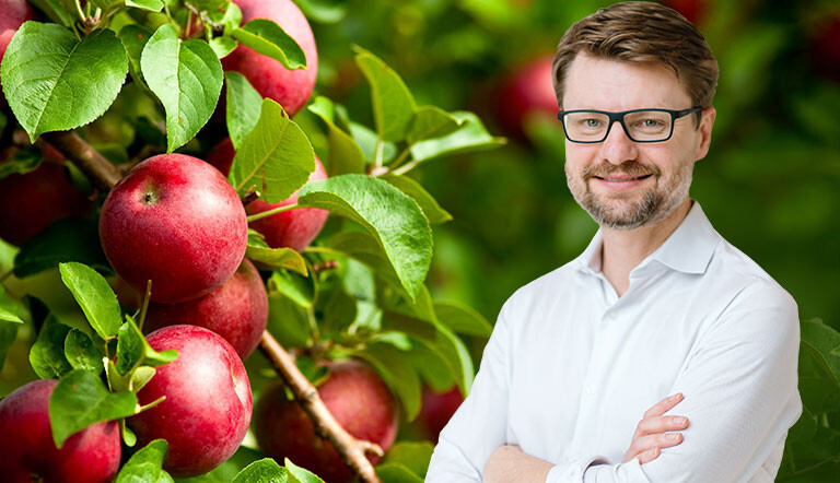 Cornie in front of Apple Background
