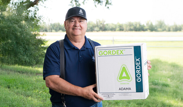 Gord Hounjet provided feedback from the field that ultimately resulted in the development of the GORDEX™ herbicide he is holding.