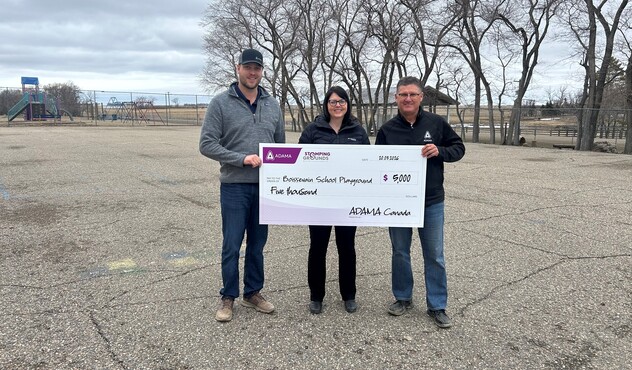 ADAMA presenting Stomping Grounds cheque to Boissevain School Playground
