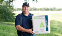 Gord Hounjet provided feedback from the field that ultimately resulted in the development of the GORDEX™ herbicide he is holding.